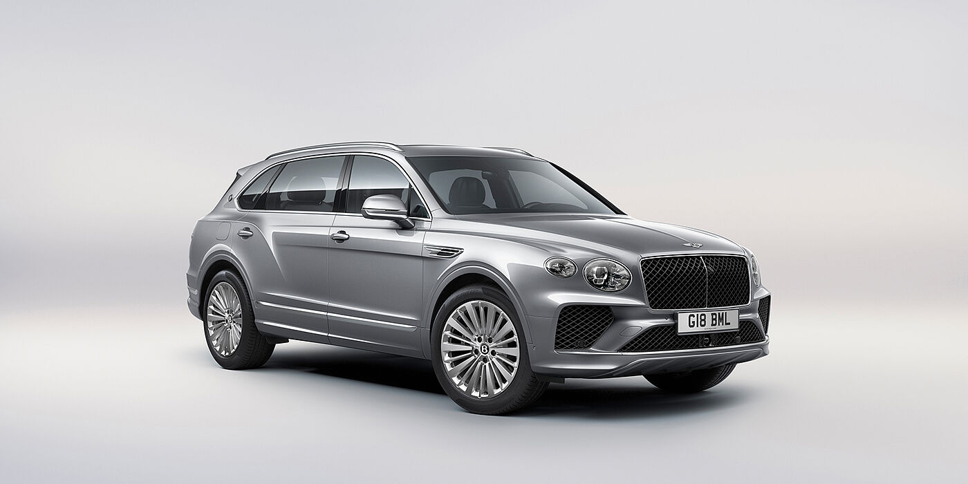 Bentley Berlin Bentley Bentayga Extended Wheelbase luxury SUV front three quarter view in Moonbeam paint with 21 inch five spoke painted wheels