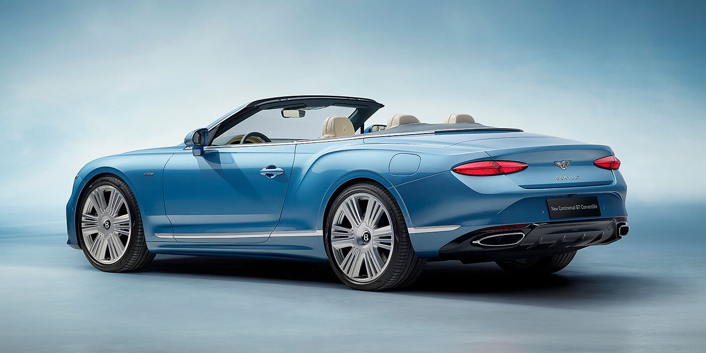 Bentley Berlin New Bentley Continental GTC Azure convertible rear view in Light Windsor blue paint with 22 inch ten spoke wheels and chrome exterior details