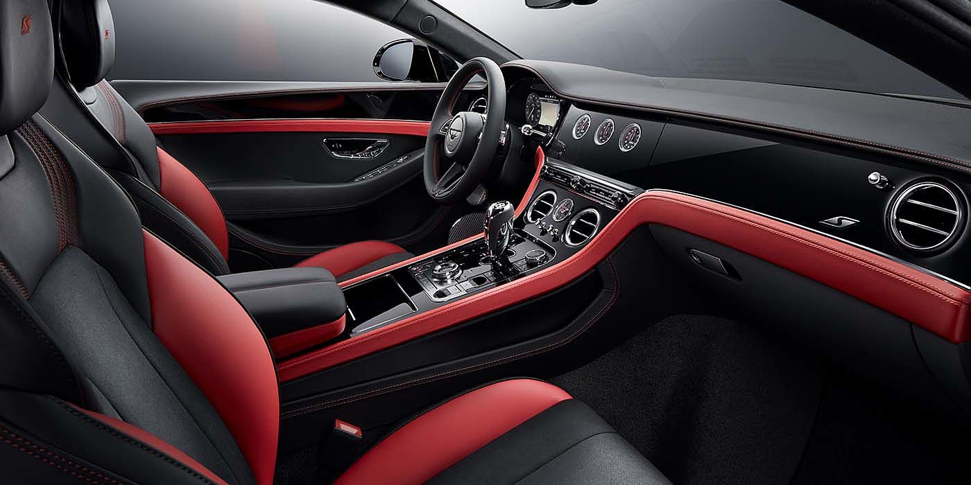 Bentley Berlin Bentley Continental GT S coupe front interior in Beluga black and Hotspur red hide with high gloss Carbon Fibre veneer