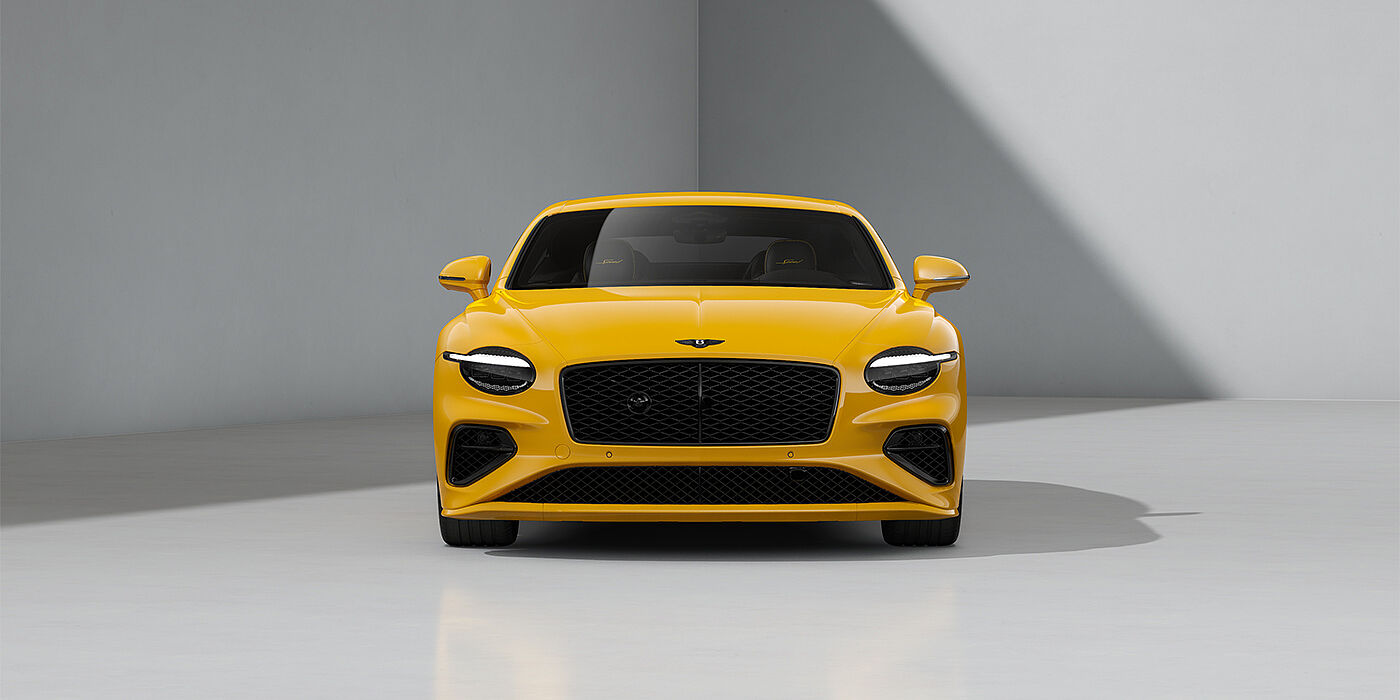 Bentley Berlin Bentley Continental GT Speed coupe in Monaco Yellow paint and 22" Ten spoke sport wheels - full front