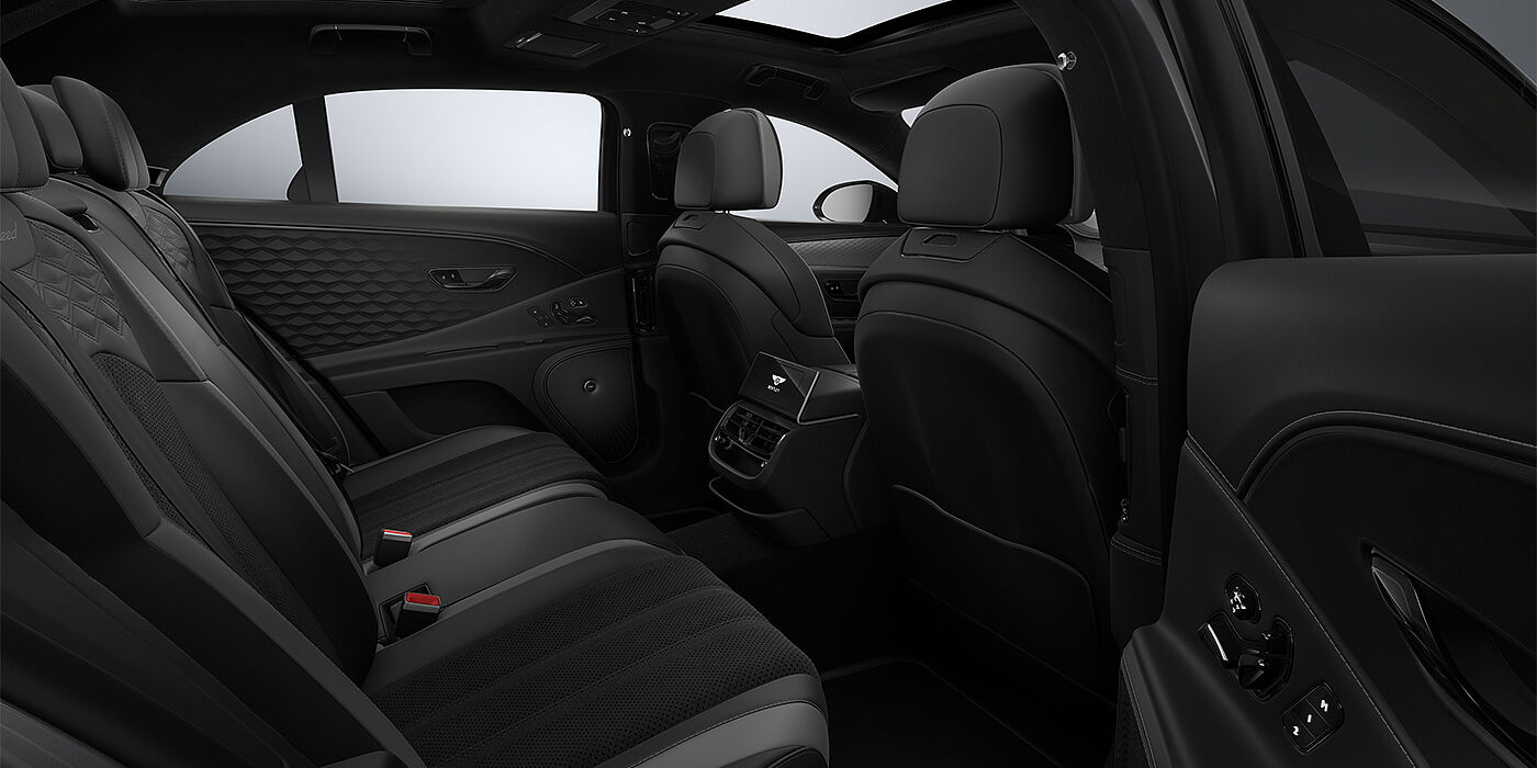 Bentley Berlin New Bentley Flying Spur Speed sedan rear interior in Gravity Grey  and Beluga Black hides with Diamond Brushed Dark Tint Aluminium veneer