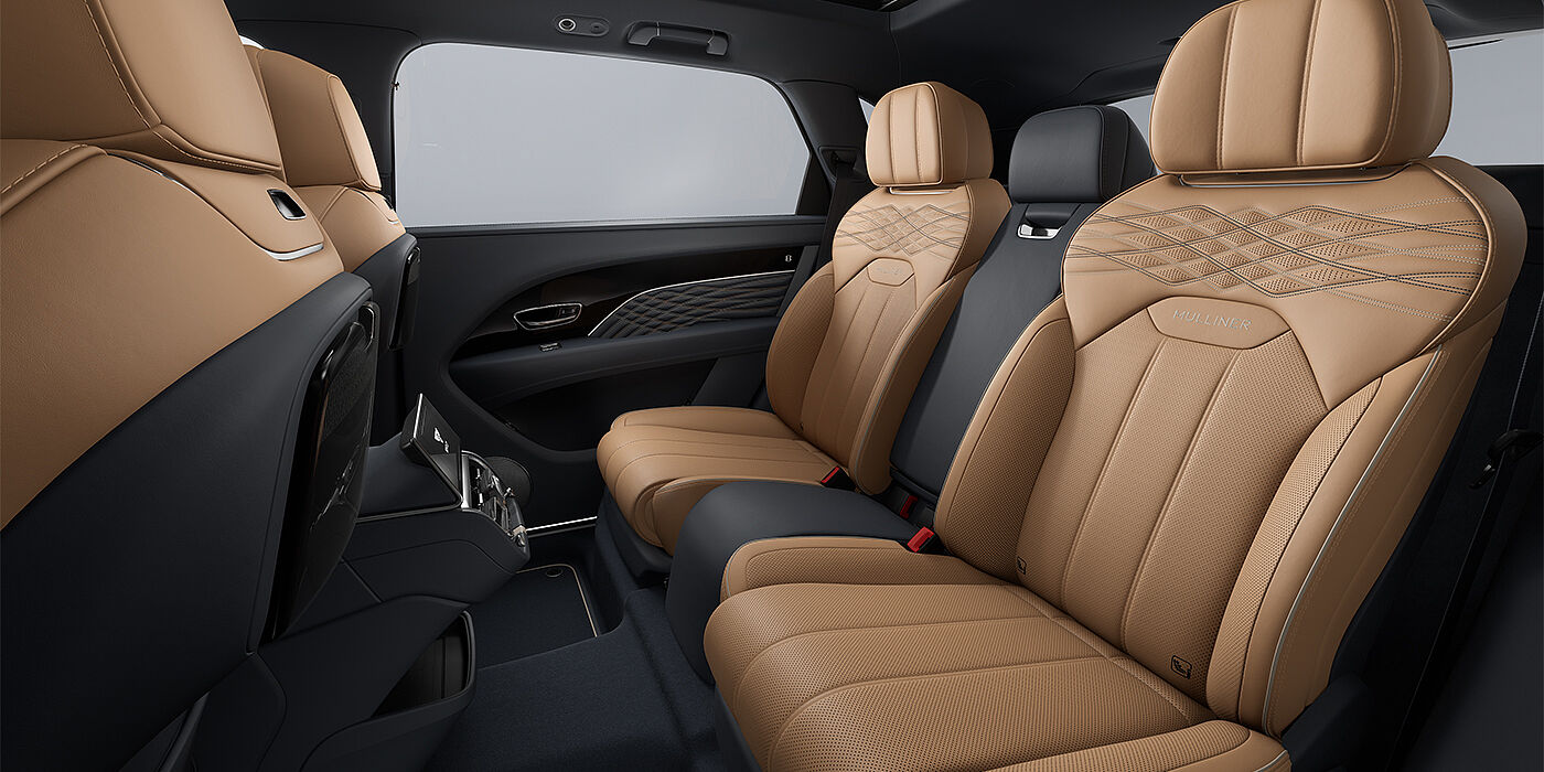 Bentley Berlin Bentley Bentayga EWB Mulliner SUV rear interior in Camel and Brunel hides with Mulliner contrast stitching