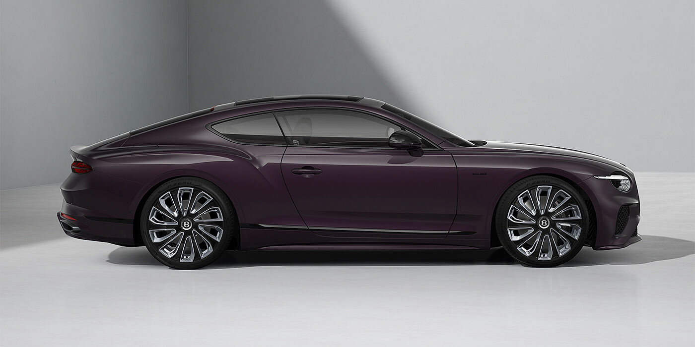 Bentley Berlin Bentley Continental GT Mulliner coupe in Damson paint and 22" Mulliner wheels - profile 3/4
