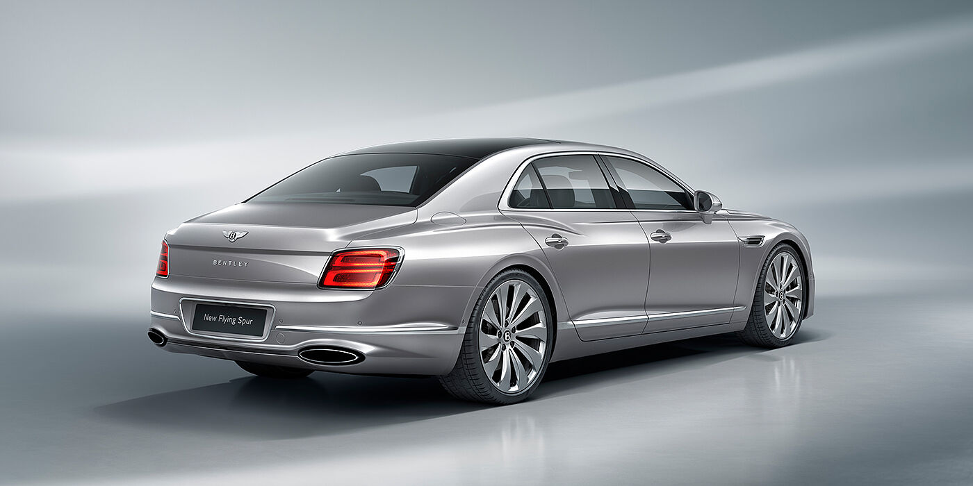 Bentley Berlin New Bentley Flying Spur sedan rear view in Silverlake paint with ten spoke wheels and chrome matrix grille