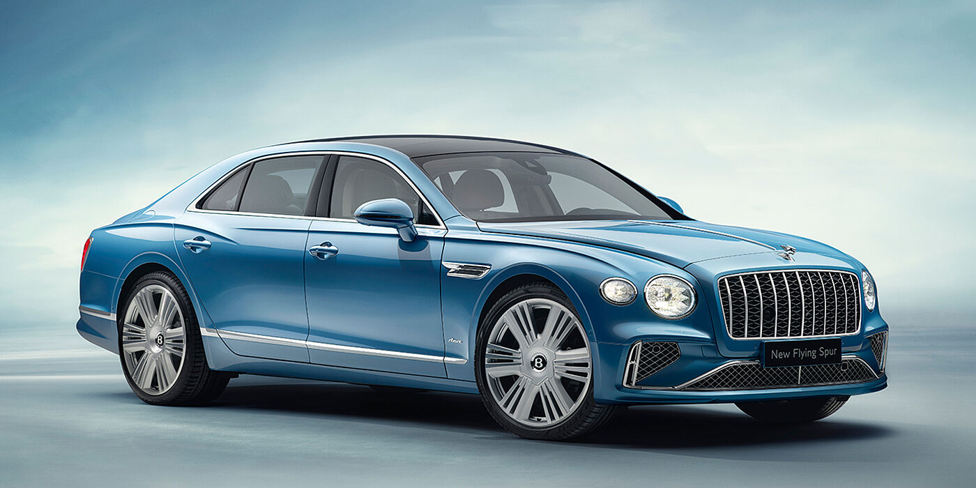 Bentley Berlin New Bentley Flying Spur Azure sedan front view in Light windsor blue by Mulliner paint with 22 inch Azure wheels and chrome exterior details