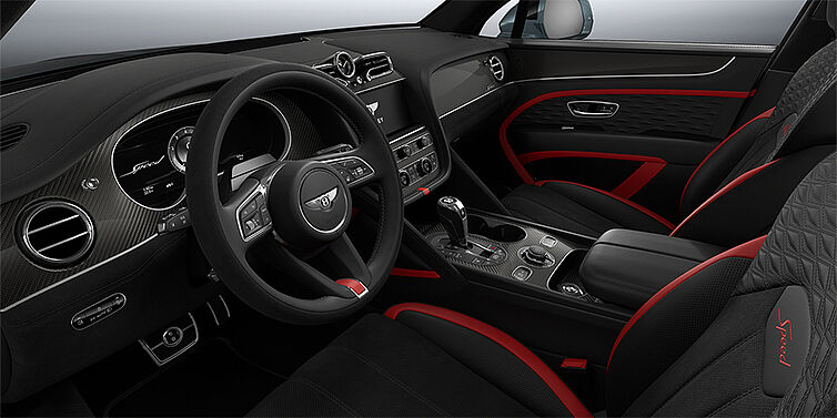Bentley Berlin Bentley Bentayga Speed SUV front interior in Pillar Box Red and Beluga black hides with Carbon Fibre veneer
