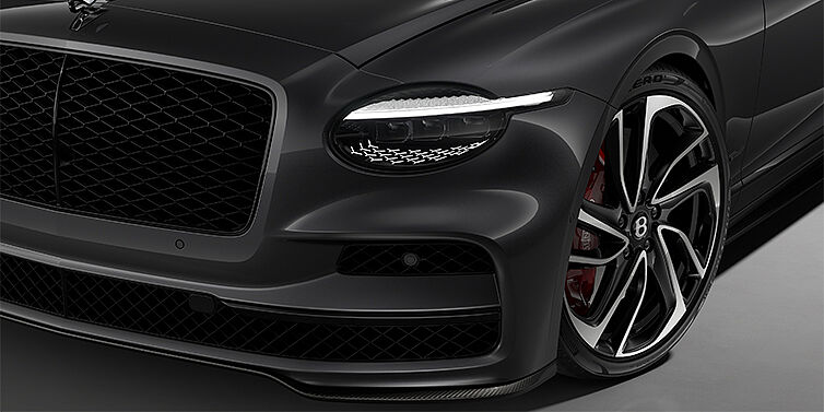 Bentley Berlin New Bentley Flying Spur Speed sedan head lamp against Magnetic paint with  22" Swept spoke Black & Machined wheel