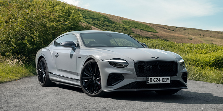 Bentley Berlin Bentley Continental GT front three quarter with Carbon Fibre Specification parked on road.