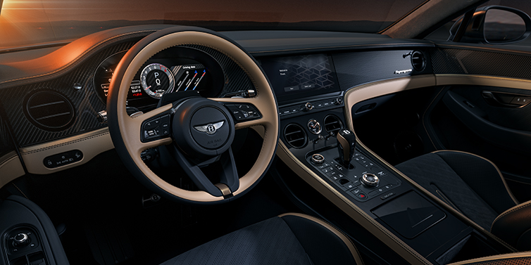 Bentley Berlin Bentley Supersports front interior in Beluga and Camel hides with Bronze accents and high gloss black carbon fibre veneer.