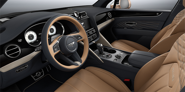 Bentley Berlin Bentley Bentayga EWB Mulliner SUV front interior in Camel and Brunel hides with Grand Black veneer and Aluminium console