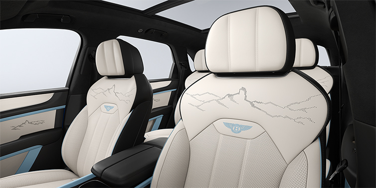 Bentley Berlin Bentley Bentayga Artenara Edition SUV front seats in Linen and Beluga Black hides with Light Blue accents and Artenara stitch detail