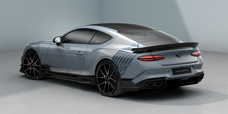 Bentley Berlin Bentley Supersports rear three quarter in "Daybreak" Design theme with Jetstream blue paint and Arctica white and Portofino blue paint stripes across the rear haunch.