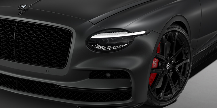 Bentley Berlin New Bentley Flying Spur S sedan head lamp against Anthracite Satin paint with  22" Sports wheel