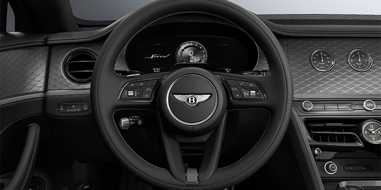Bentley Berlin New Bentley Flying Spur Speed sedan steering wheel and dash in Gravity Grey and Beluga black hides and Diamond Brushed Dark Tint Aluminium veneer