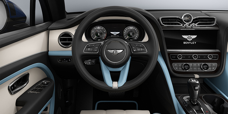 Bentley Berlin Bentley Bentayga Artenara Edition SUV steering wheel view in Linen and Beluga Black hides with Light Blue accents and Piano Linen veneer
